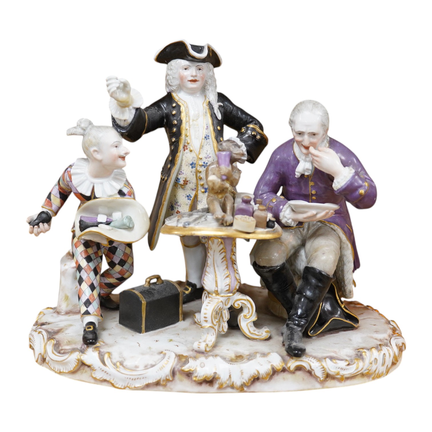 A 19th century Meissen group of The Dentist, outside decorated, incised model no. 186, 21cm. Condition - broken and restored